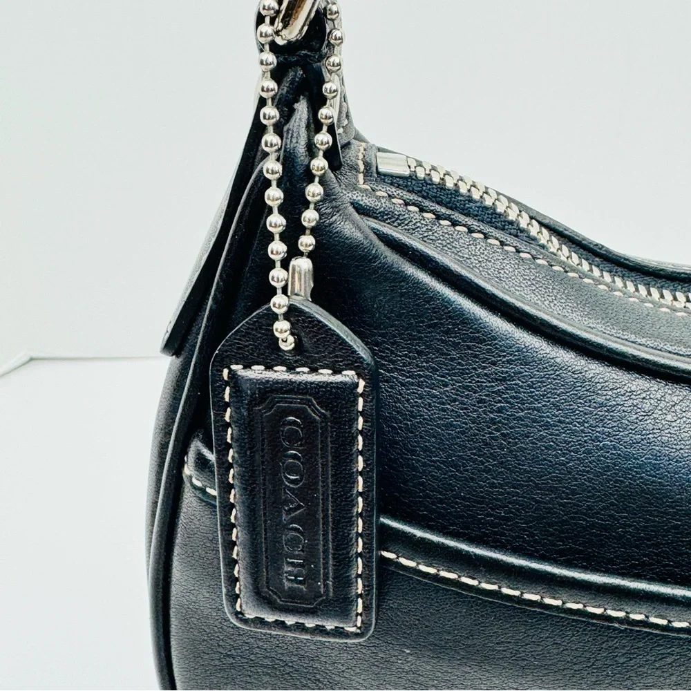 Coach Vintage Hampton Demi Hobo. Smooth, soft black leather. Crescent shape.